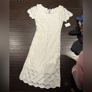 Cream crochet dress.